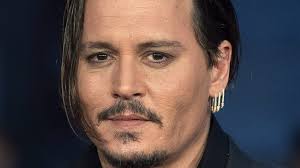 Johnny Depp non sarà il testimonil Trojan